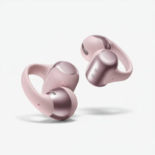 Gadgetdepop SHOKZ OpenDots ONE pink open-ear wireless headphones with a sleek, ergonomic design for comfortable wear.